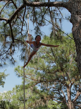 Briana Phelps performs on a rope