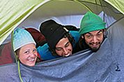 3 friends in a tent
