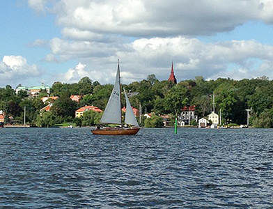 Stockholm Canal tour boats share the water with local sailors as well.
