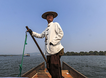 Boatman on West Lake