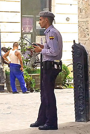 Cuban policeman on public square