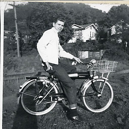 Young Ted Blishak on his bicycle