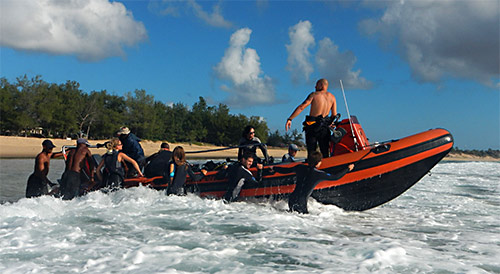 Getting over the surf was a new experience in