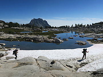 Enchantments, hikers crossing a snowfield