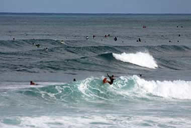 Oahu Ehukai Beach Park surfers