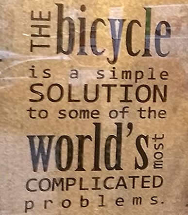 Bicycle sign in window