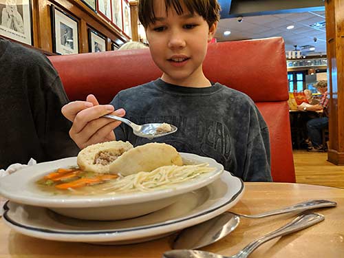 Kid dining in Houoston