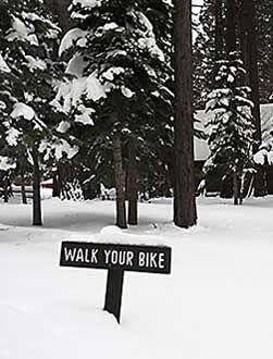 Walk your bike sign