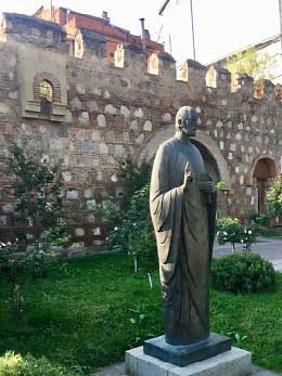 Tbilisi statue of saint at old city wall