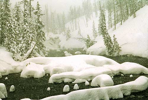 Snow pillows on the Lewis River, Yellowstone, Montana