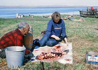 Deanne Burch cutting up seal