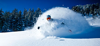 Mammoth Mountain skier blasting powder snow