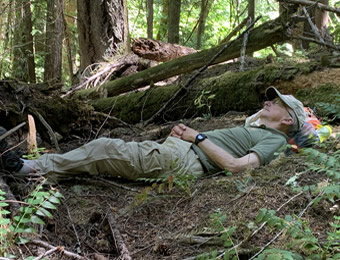 McKenzie River, Oregon, hiker Steve taking a break