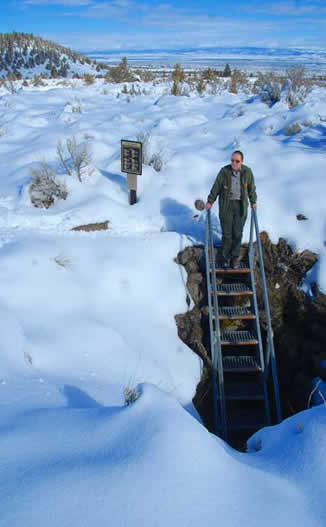 Lava Beds National Monument cave with snow around the entrance