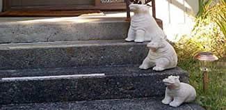 Plaster hippos on steps