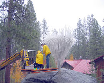 Cleaning Dale Chihuly's Icicle at Sleeping Lady Resort