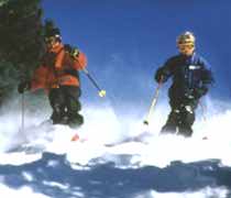 Two skiers