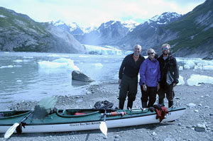 Kayaking family on the beach