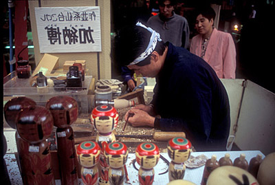 Sendai craftsman making kokeshi dolls