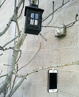 Phone charging on outside wall