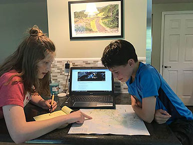 Kids studying map