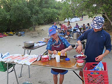 Hells Canyon fixing dinner on the beach