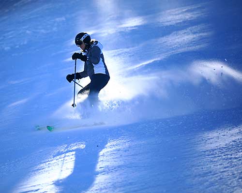 Brighton skier carves a turn