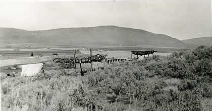 Olene, Oregon, sucker fish drying on racks