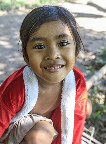 Young girl on Koh Trong Island across the Mekong River from Kratie, Cambodia